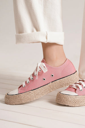 Close-up of a model wearing ASH-08 Espadrille Sneakers by Beast Fashion in pink, ideal for school or casual outings this SPRING and SUMMER. These fashionable espadrille shoes add a playful touch to any outfit while ensuring comfort. Espadrille, New Shoes, Sale Shoes, Sneakers.