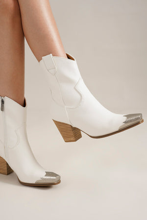 Chic side view of DAKOTA-01 Western Toe Cap Ankle Boots by Beast Fashion in white, showcasing the unique pointed toe and sturdy heel. These are versatile ankle boots suitable for summer parties and weddings, on sale now! Keywords: western ankle boots, ankle boots, booties.