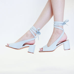 Lace-Up Block Heel Sandal ISABEL-01 by Beast Fashion displayed in an elegant light blue, these women's open toe sandals are ideal for summer outings. A perfect blend of style and comfort, this heeled sandal features wrap-up laces.