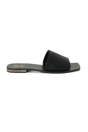 Classic black JOEY-01 Minimalist Slide Sandals by Beast Fashion, showcasing a simple yet chic design perfect for summer outings. This stylish pair is an essential for any vacation, blending comfort and trend as one of the top sandals on sale.