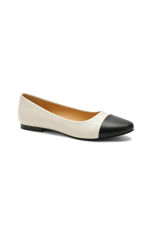KOLE-07 Cap-Toe Ballet Flats by Beast Fashion in cream and black, ideal for your party, school, wedding, or vacation outfits. Fashionable cap toe ballet flats to elevate your look.