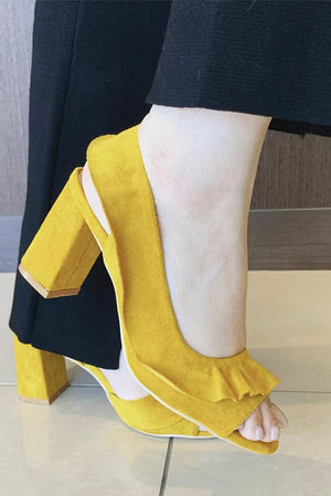 Close-up of a stylish yellow pair of ROSEL-01 ruffled block heel sandals by Beast Fashion, featuring a feminine ruffle design, perfect for summer outings or vacation styling. Heeled Sandal, Heels, Sandals, SUMMER, VACATION, Wrap Sandals.