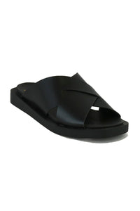 Another angle of VICENTE-09 Crisscross Flat Sandals by Beast Fashion in black. These slide sandals are designed with a soft footbed, making them ideal for summer vacations and all-day wear.