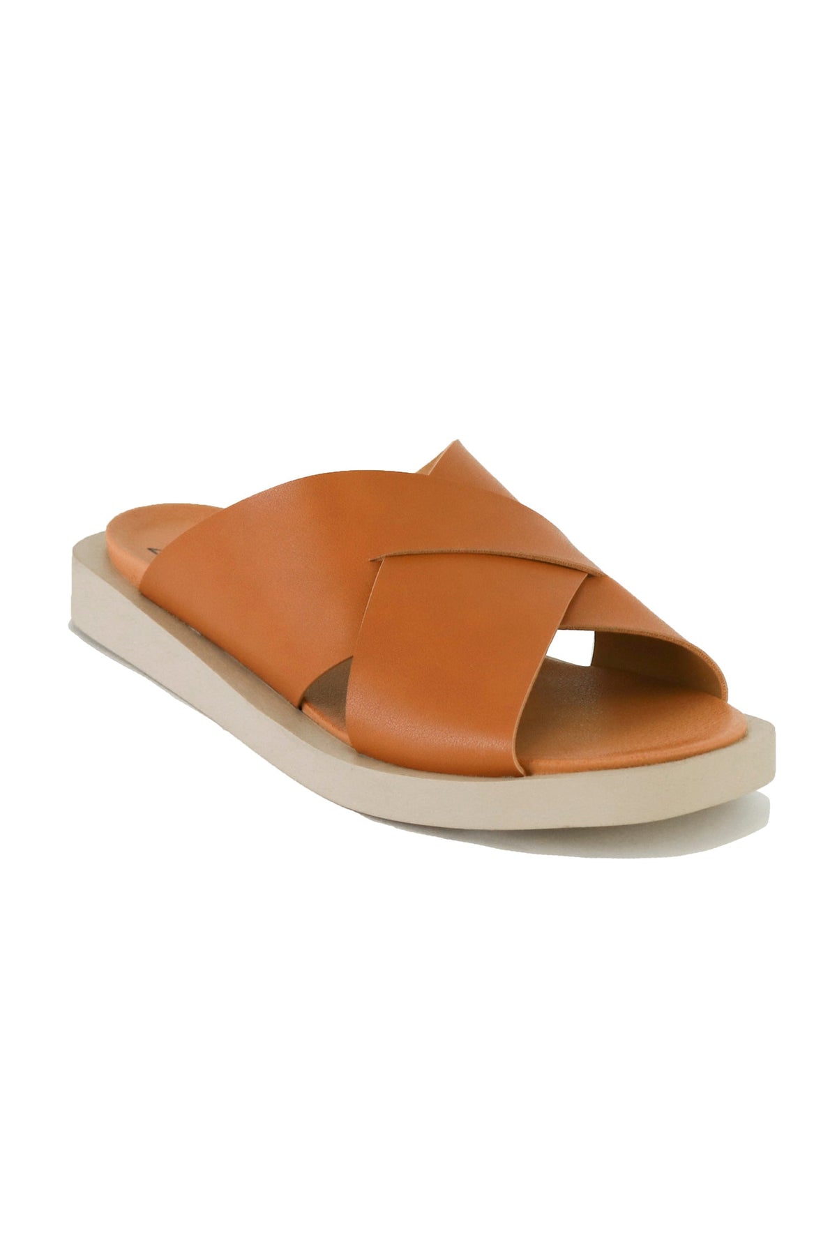 Angle view of VICENTE-09 Crisscross Flat Sandals by Beast Fashion in a trendy brown design. These flat sandals offer a cushioned footbed, perfect for enjoying leisurely time during summer vacations.