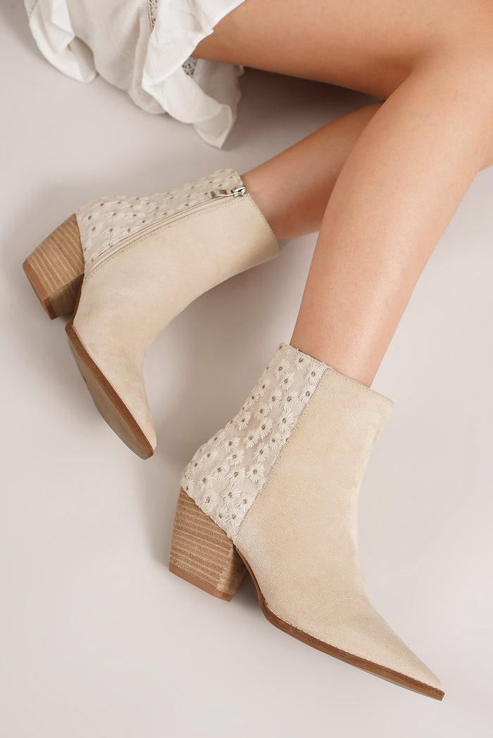Stylish floral embellished ankle boots from Beast Fashion, featuring a beige color and floral embroidery, perfect for adding a chic touch to your spring and summer outfits. These ankle boots are ideal booties for any occasion and a fantastic new arrival in women's shoes.