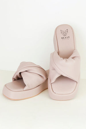 Stylish CAMILA-06 platform slide sandals by Beast Fashion, featuring a chic, twisted upper design. Perfect flat sandals for SUMMER vacations. Ideal flatform sandals with cushioned footbed, combining comfort and style for your casual outings.