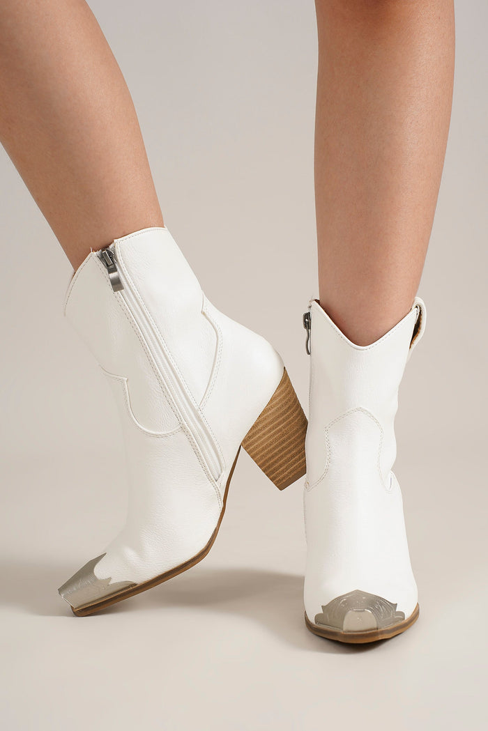 Stylish DAKOTA-01 Western Toe Cap Ankle Boots in white by Beast Fashion, featuring a sleek design and metal toe cap. Perfect for any occasion including parties and vacations. Ideal all season booties for summer or weddings and available in a sale. Keywords: western ankle boots, ankle boots, booties.