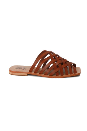 Side view of the LANA-03 strappy flat sandals from Beast Fashion showcasing their fashionable and comfortable slip-on style, perfect for slides during summer and vacations.