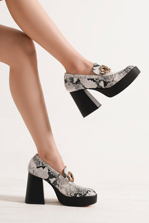 Stylish MOANA-01 chunky heel loafers by Beast Fashion featuring a snake print design, perfect for elevating any outfit. These platform loafers offer both flair and sophistication, ideal for stylish looks. Heels, Platforms, Sale Shoes.