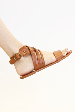 Beast Fashion TRAVIS-16 Strappy Sandals showcasing a stylish wrap design, perfect flat sandals for summer vacations. Lightweight and comfortable, ideal for casual outings. Perfect choice for sale shoes this summer.