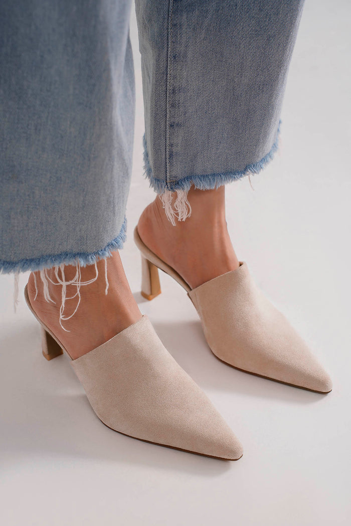 Beast Fashion TRINEE-06 Mule Heels in a stylish beige color, showcasing fashionable mule shoes. Perfect for city outings, everyday wear, and holiday parties, these heeled mules are a best seller and a new arrival in the collection.